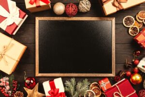 personalized photo frames for Christmas surrounded by gifts